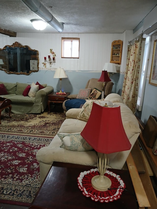 living room featuring a textured ceiling