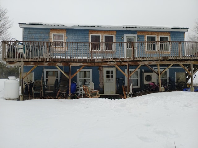 view of snow covered house