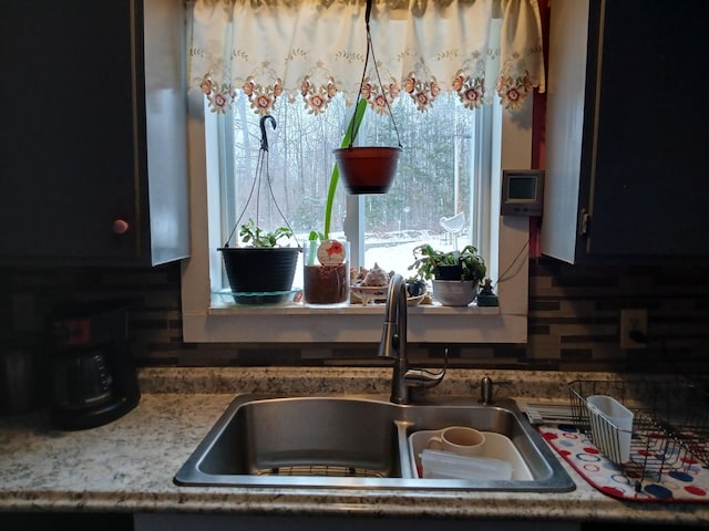 kitchen featuring a sink