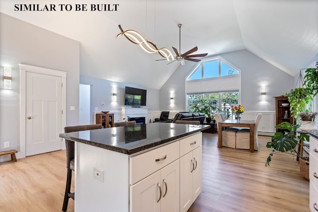 LOT11 Raspberry Ln, Topsham, ME 04086 - kitchen with light wood finished floors, a kitchen island, white cabinetry, and a ceiling fan