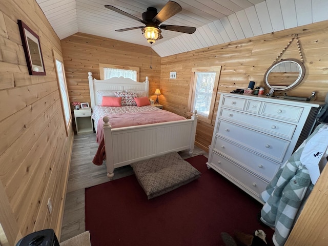 35 Swan Ln, Dexter, ME 04930 - bedroom featuring wood ceiling, wooden walls, vaulted ceiling, and ceiling fan