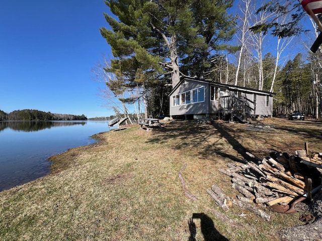 35 Swan Ln, Dexter, ME 04930 - view of property exterior featuring a water view