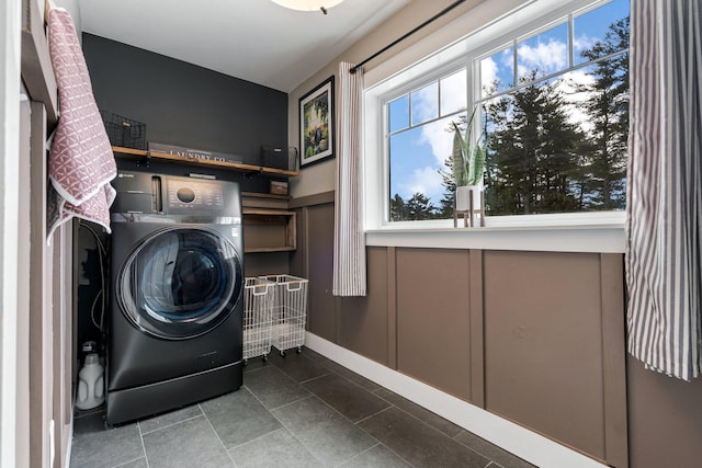 laundry area featuring laundry area and washer / clothes dryer