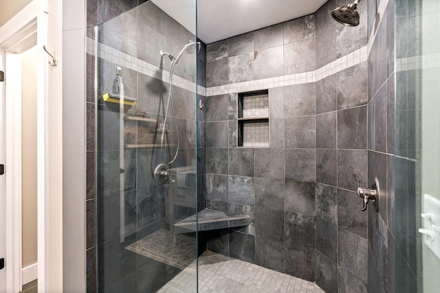 bathroom with a shower stall