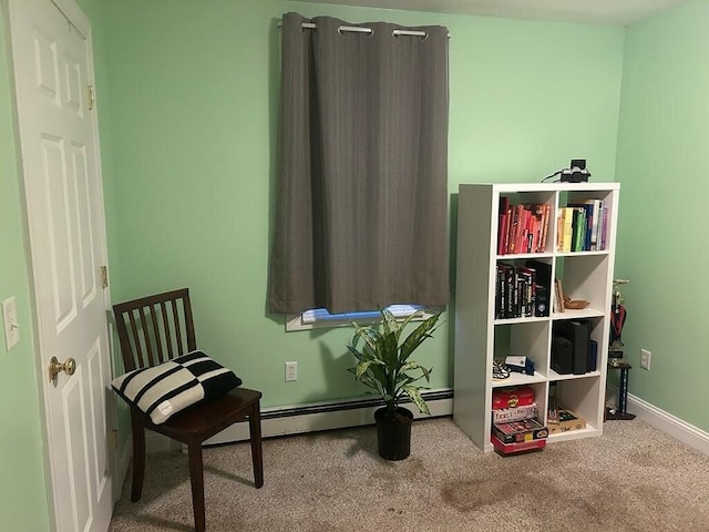 interior space featuring carpet flooring and baseboards