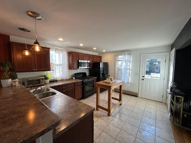 kitchen featuring a toaster, dark countertops, recessed lighting, a sink, and black appliances