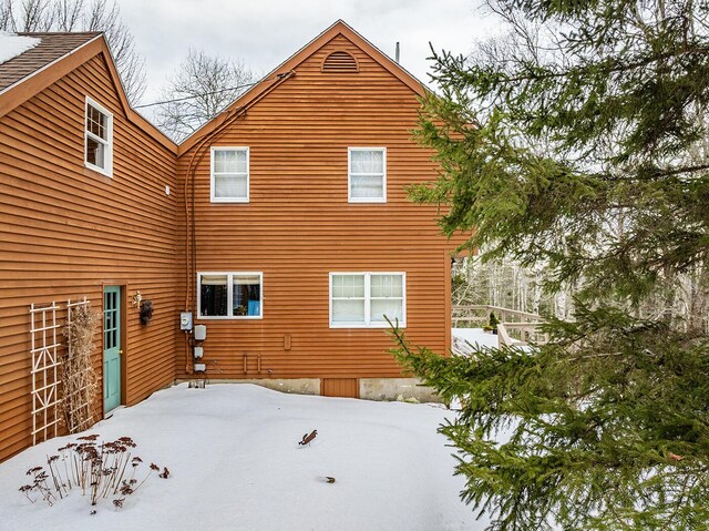 view of snow covered property