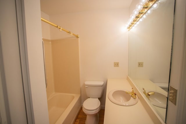 full bath with toilet,  shower combination, and vanity