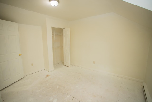 empty room featuring a baseboard heating unit