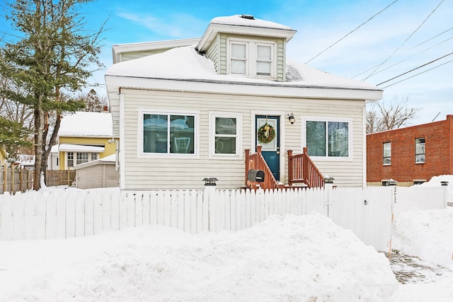 view of front of home with fence