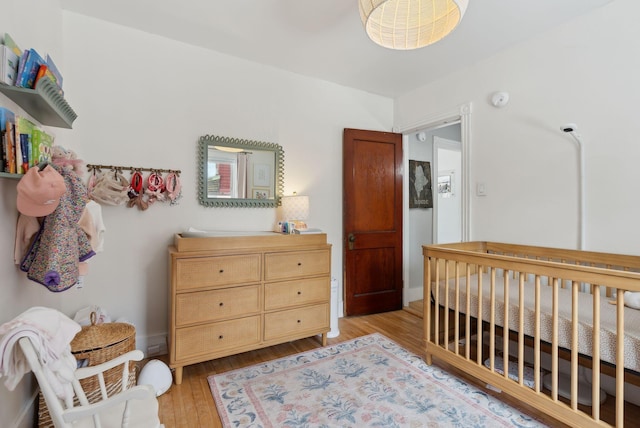 bedroom featuring light wood-type flooring