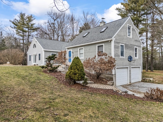 view of front of property featuring driveway, a shingled roof, a chimney, a front lawn, and a garage