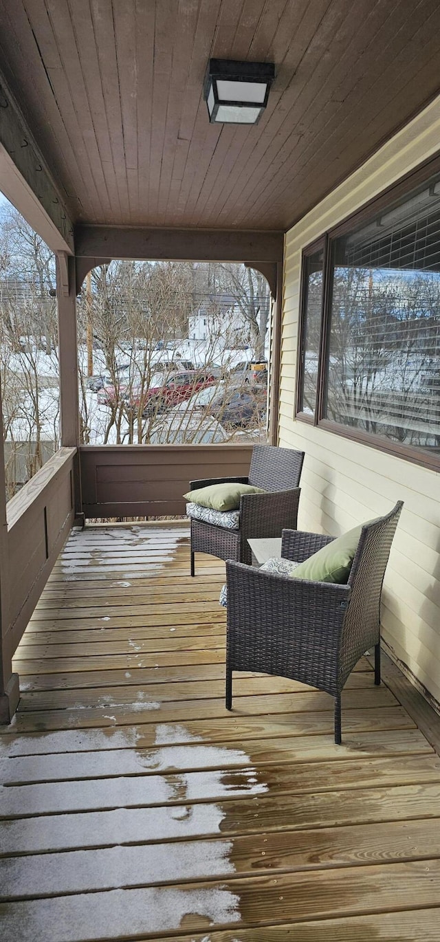 view of snow covered deck