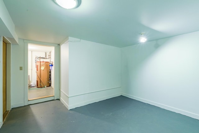 additional living space with finished concrete flooring and baseboards