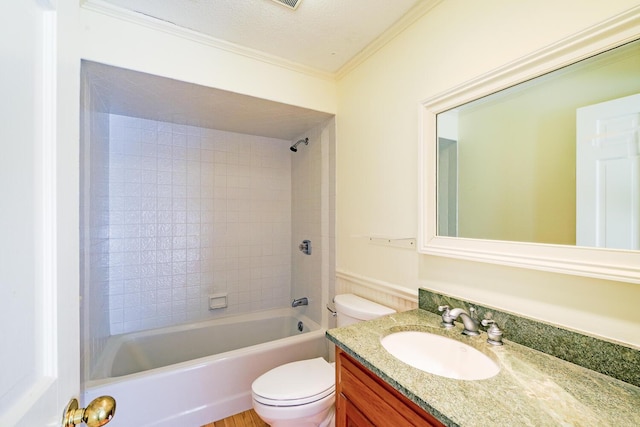 bathroom featuring shower / washtub combination, crown molding, toilet, vanity, and a textured ceiling