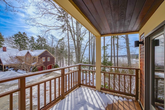 view of snow covered deck