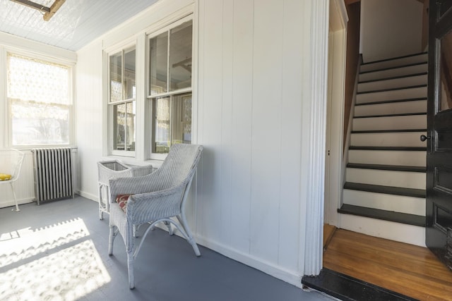 exterior space with radiator and covered porch