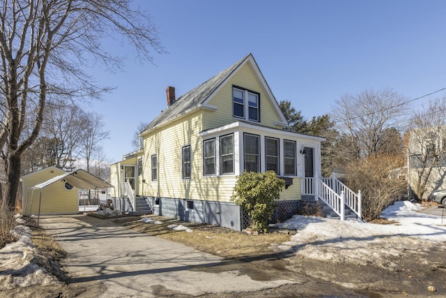 view of home's exterior featuring a chimney