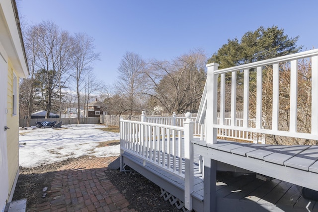 exterior space featuring a wooden deck and a fenced backyard