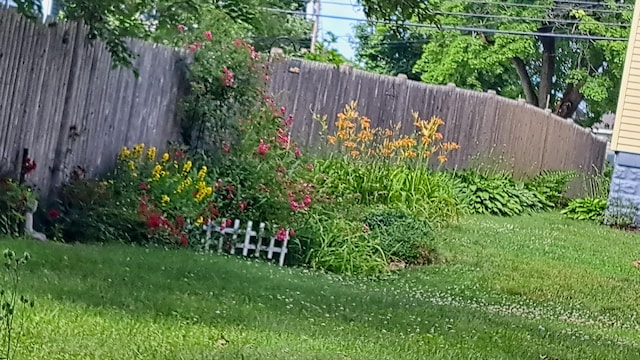 view of yard with fence