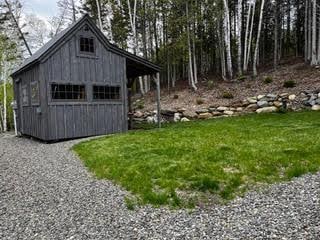 view of outbuilding featuring an outdoor structure