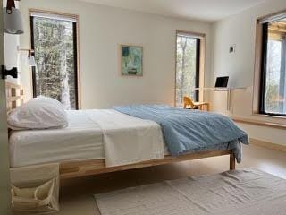 bedroom featuring baseboards