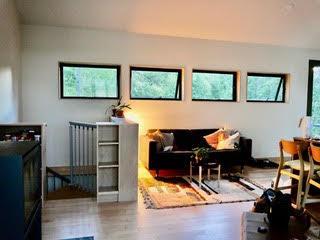 living area with wood finished floors