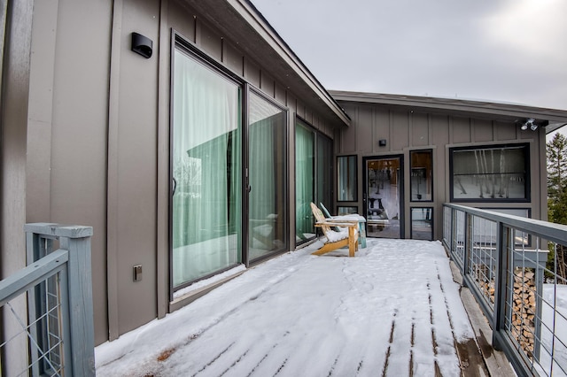 view of snow covered deck