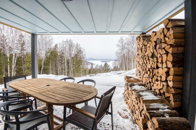 exterior space with outdoor dining space and a mountain view