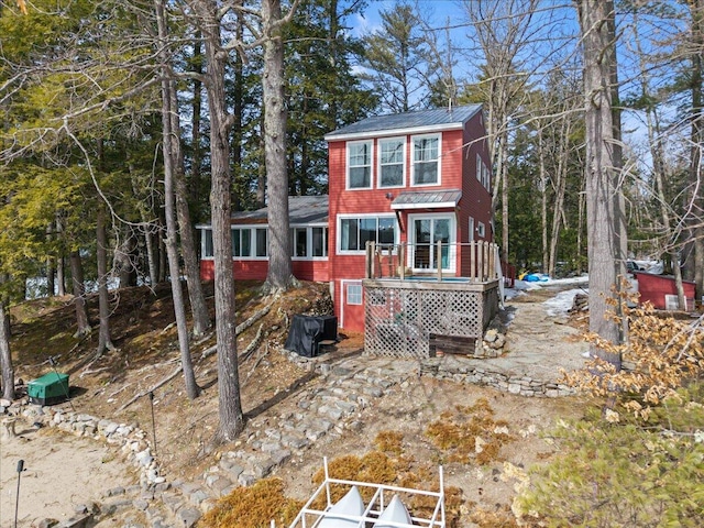 view of front of home featuring a wooden deck