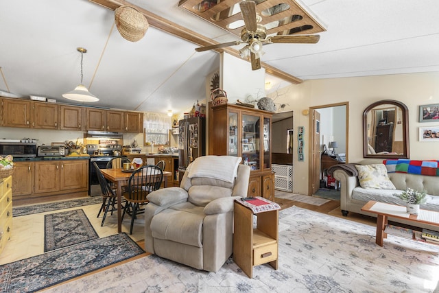 living room featuring a toaster, lofted ceiling with beams, and a ceiling fan