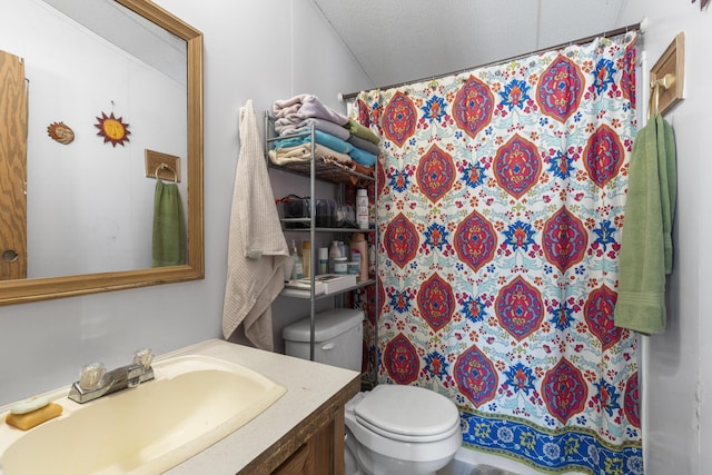 bathroom featuring vanity, a shower with shower curtain, and toilet