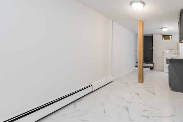 interior space with a baseboard heating unit and marble finish floor