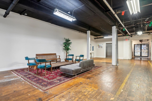 basement featuring wood-type flooring