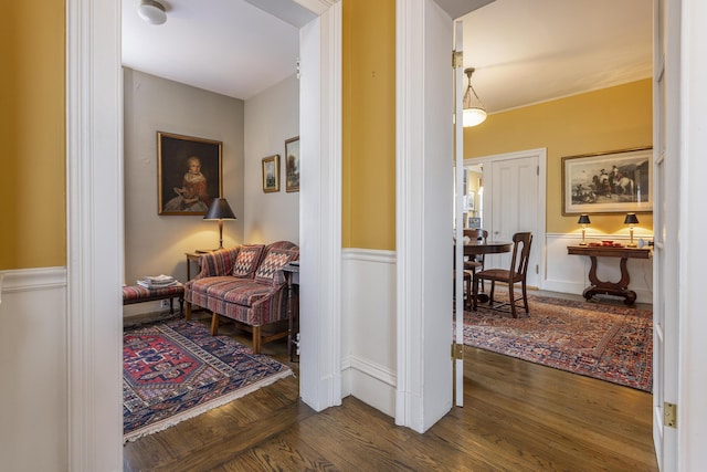 corridor featuring dark wood-style floors