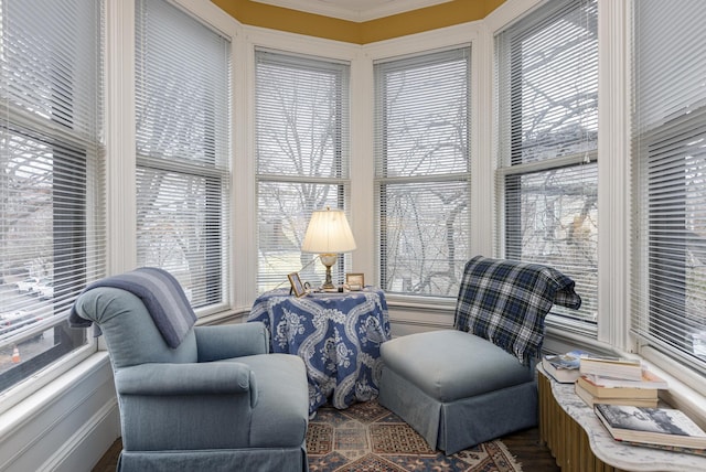 sitting room with ornamental molding