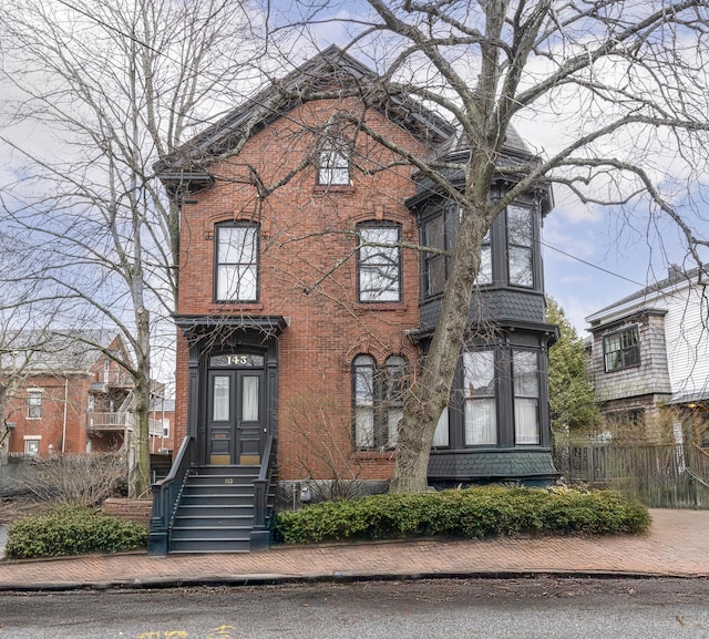 view of front of property with brick siding