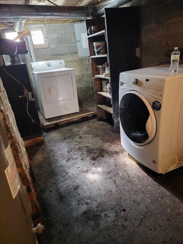 32 Maple St, Fairfield, ME 04937 - laundry area with electric panel and washing machine and clothes dryer