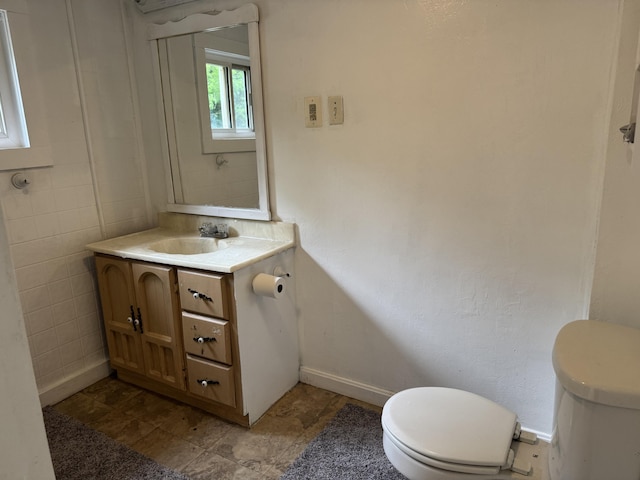 32 Maple St, Fairfield, ME 04937 - bathroom featuring toilet and vanity