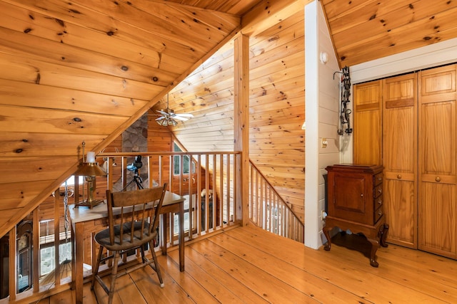 additional living space with ceiling fan, wooden ceiling, light wood-style flooring, and vaulted ceiling