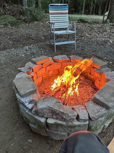 exterior space with an outdoor fire pit