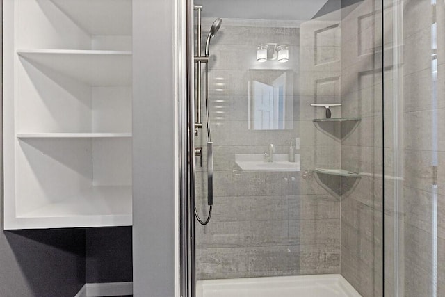 full bathroom featuring a shower stall