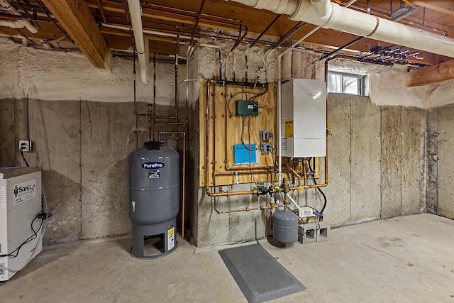 utility room with tankless water heater