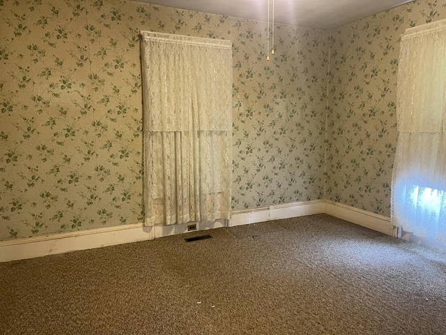 48 Gay St, Rockland, ME 04841 - spare room with wallpapered walls, baseboards, and carpet floors