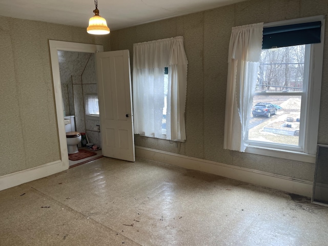 48 Gay St, Rockland, ME 04841 - spare room with wallpapered walls and baseboards