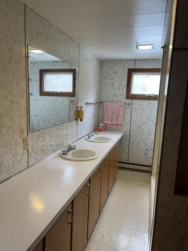 48 Gay St, Rockland, ME 04841 - bathroom featuring wallpapered walls and a sink