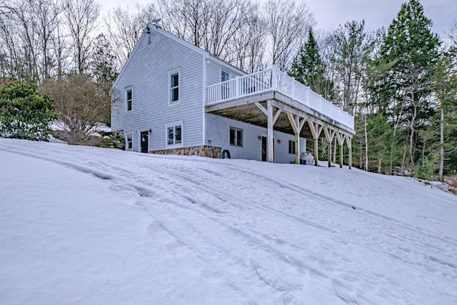 view of front of home with a wooden deck