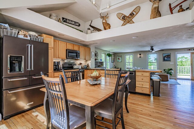 543 Middle Rd, Dresden, ME 04342 - dining area featuring light wood-type flooring, a ceiling fan, high vaulted ceiling, and recessed lighting
