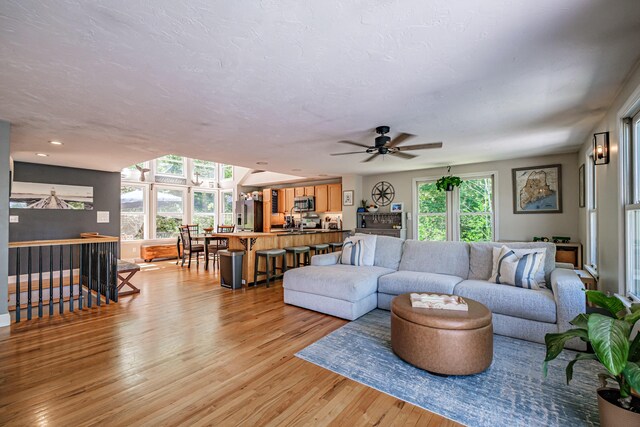 543 Middle Rd, Dresden, ME 04342 - living room with light wood finished floors, healthy amount of natural light, ceiling fan, and recessed lighting