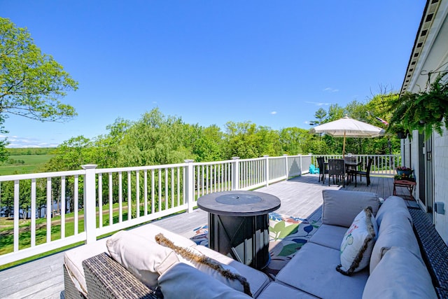 543 Middle Rd, Dresden, ME 04342 - wooden terrace with outdoor lounge area and outdoor dining space